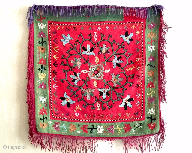 A beautiful Antique Uzbek Silk Suzani Embroidered ilgich hanging. It dates to the 19th century and while assessing its aesthetics one can assume it is the work of the Lakai Uzbek tribes  ...