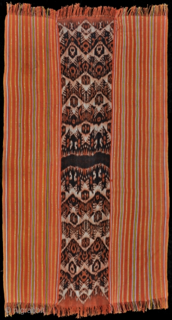 Typical mau (man's cloth) from Amanuban, Timor, Indonesia. Central band of warp ikat (34 cm wide) done in handspun yarn and natural dyes with four rows of birds that alternately touch wings  ...