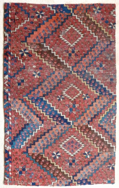 A beautiful fragment from an Ersari Beshir main carpet. Middle Amu Darya region, early 19th Century. The four sides are secured by ticking sewn on the back. 4'2" x 2'6" / 127  ...