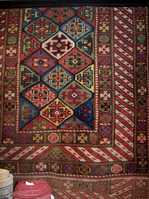 AN ANTIQUE PERSIAN KURDISH RUG VIBRANT VEGETABLE DYES.SIZE 225 * 113 CM
100% WOOL ON WOOL                  