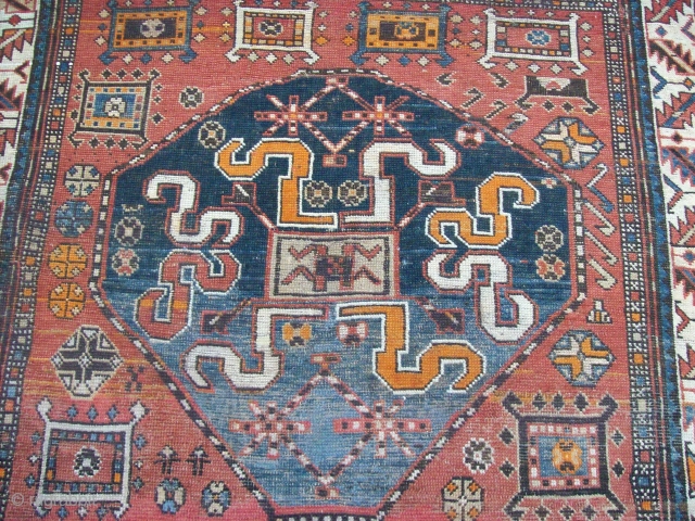 Chondzoresk rugs with this motive have been attributed to Kazak under the name of "Cloudband Kazak" the motive may derive from caucasian dragon carpet
it is probably the second most published karabagh motif.it  ...