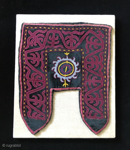 Khirgiz decorative felt stirrup cover.  20th century. Probably for ceremonial usage.   It was constructed using a natural brown, wool felt base, then applied with black velvet cloth and embroidered  ...