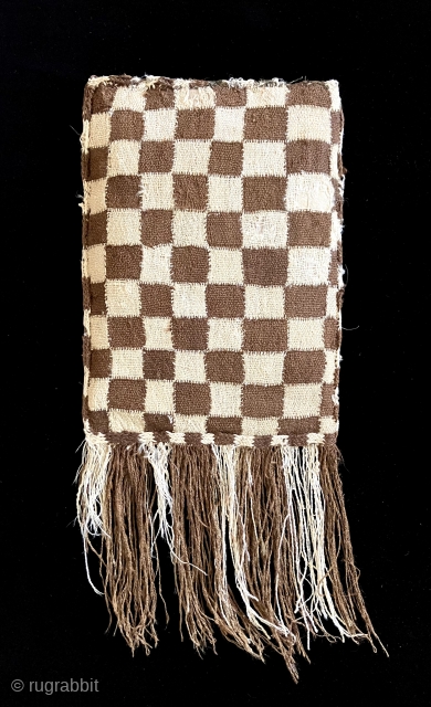  Checkerboard patterned Nasca Bag. A.D. 200 - 600.  A large bag with discontinuous warp and weft woven structure.  Conserved to a lining.  This is a very nice example  ...