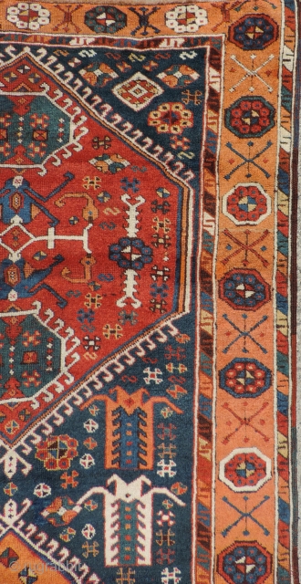 East Anatolian rug with medallions. 1st half of the 19th century or before. Three serrated medallions on a blue field. Missing minor border at top and bottom. Original selvedges.  Beautiful even  ...