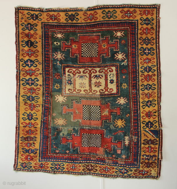 19th century Kazak fragment. In need of some TLC, priced accordingly. Great and dramatic display piece! 4'10" x 5'5"              