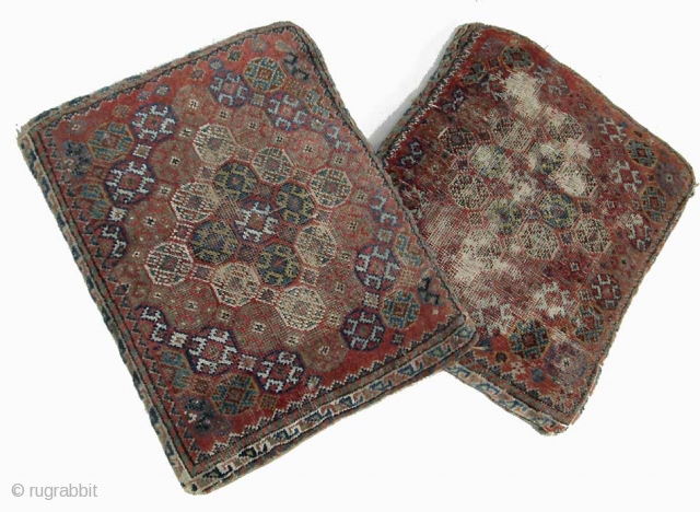 Pair of Qashqa'i cushions, converted from saddle bag, nice old items with concentric flowerhead diamond forms enclosed by interlocking borders, 19th.century, 35 x 45cm each        