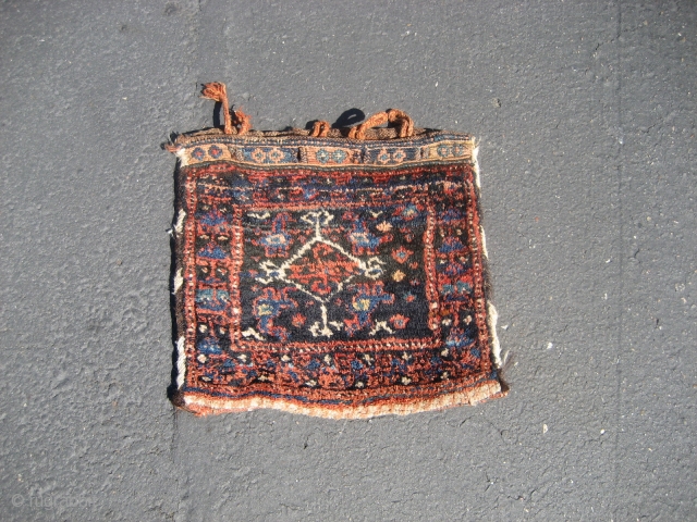 Small Afshar(?) Bag Face Complete With Back

Measures about 14" x 14".  Full pile, very dirty.                 