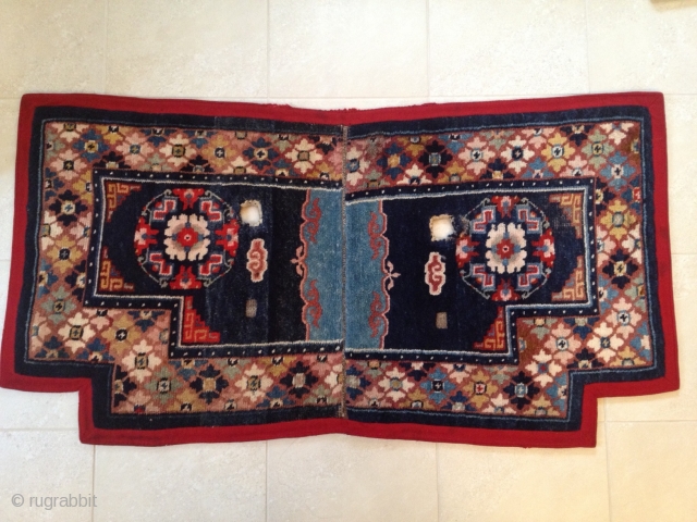 Tibetan Saddle Rug from late 19 century.  Purchased originally from Xanadu Gallery in San Francisco with verified authenticity.  Excellent condition.           