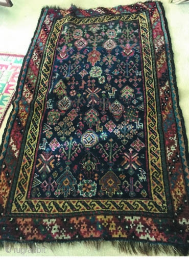 Very tribal Afshar rug with good zoomorphic designs and a very interesting 
outer border. Decent pile, all natural colors and nice silky wool.          