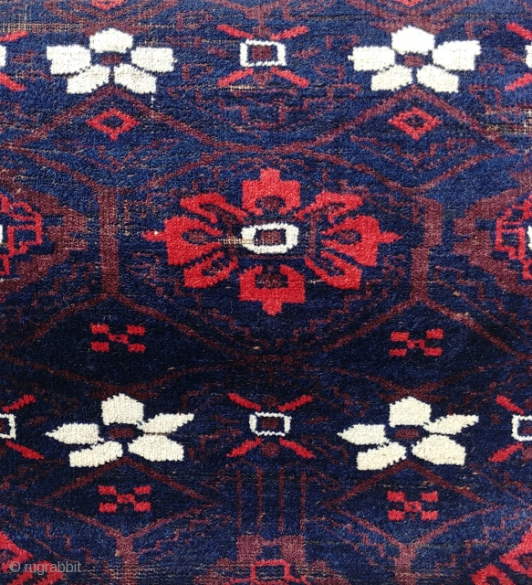 Antique Mina Khani Baluch. 254cm x 90 cm (8'3" x 3') Cherry red and deep navy blue. Unusual borders with long knotted elems.  Camel wefts.  Corroded blacks in the border.  ...