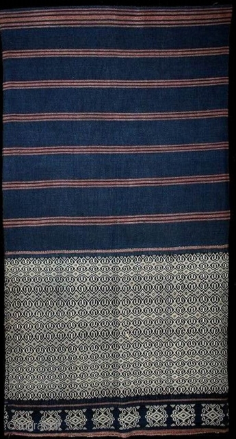 TE00864

1960s Lau Pahikung, young girl's sarong, of natural indigo dye of hand spun cotton and white supplementary weft geomatric patterns. Sumba people, Sumba, Indonesia. www.facebook.com/samyamaco

52 x 90 cm (x2)    