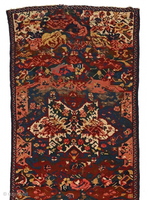 Antique Seikhur Long Carpet, 119 x 356 cm. Good condition, original blue wool side finish, corroded brown and black areas, one small gouge at end, reinforced. -- A rare design, called Kuba  ...