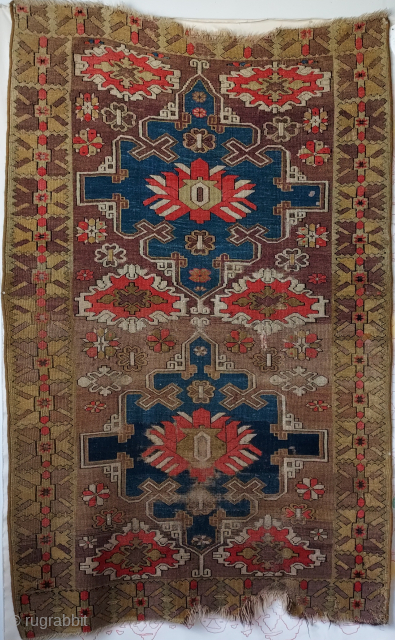 Antique 19th century Ada Milas carpet with unusual archaic design and faded fuchsine dye. Mostly even low pile, a couple of holes, sides re-wrapped in wool.Priced accordingly  USD 350.- plus shipping.  ...