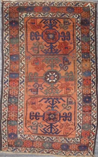 Symmetrically knotted Baluch with 3 Octagon Guls, 34 x 55 inches. An unusual late-19th century weaving in  excellent condition. The dull photos do not do justice to the lavishly used sparkling  ...