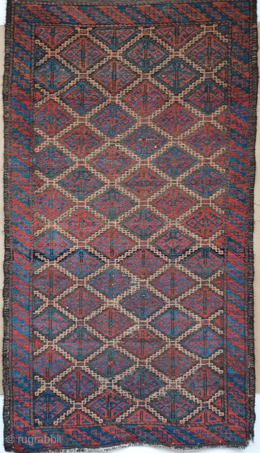 Small Baluch Diamond Lattice rug with camel hair outlines and a nice light blue. 32.5 x 58 inches. In excellent condition.  USD 575.- including shipping in the U.S. -- Please contact  ...