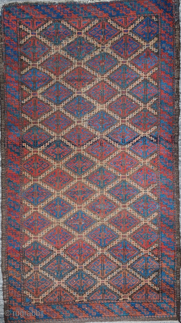 Antique Baloch wool rug with geometric motif in diamond grid pattern outlined with camel hair, 33 x 58 inches / 83 x 147 cm
USD 650.- please check out my other antique Baluch  ...