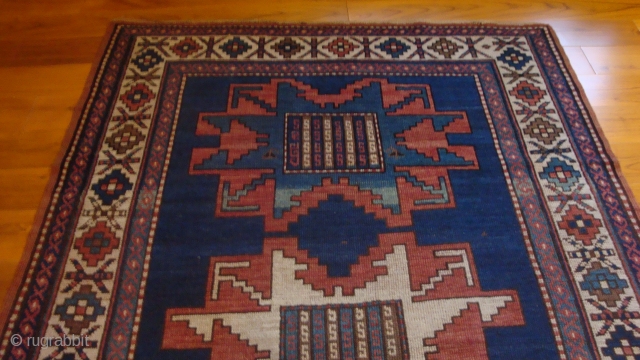 1900 Caucasian Kazak Leshgi Star.  48 x 78 inches.  Low even pile.  No damage or repairs.  Nice natural colors.          