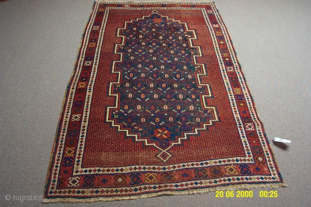 Persian Afshar measuring 3'4"x5'6", it has some traffice wear, circa 1890
                      