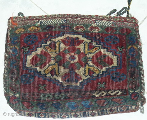 Persian 
Central South of Persia origin Ghashghai tribal khamesh area,
piled bag,size:0.42cmx0.32cm,circa 1900,no any restoration.
all natural colors at red colored weft,all wool foundation,
at low pile condition.        