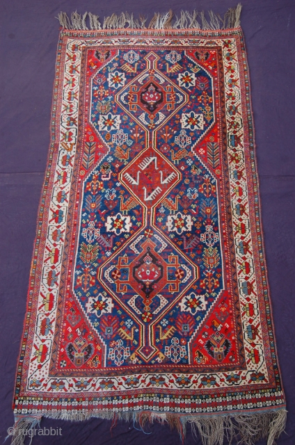 ANTIQUE TRIBAL QUASHGAI RUG (VERY PRETTY, RED WEFTED, FINE QUALITY, LOADS OF ANIMALS, AKSTAFA BIRDS/ HORSES). Size : 214 x 111 cm. Very good condition, medium pile allover with one lower area  ...