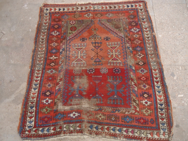 Early Anatolian Prayer Rug Fragment with good colors and design.As found.Size 3'8"*3'4".E.mail for more info and pics.                