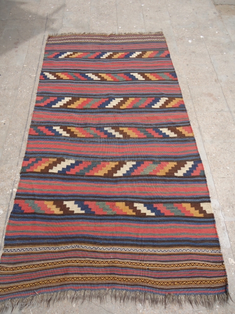 Beautiful Vermain Kilim with all good colors and very nice desigen,good weave and age.Size 8*4'3".E.mail for more info and pics.
             