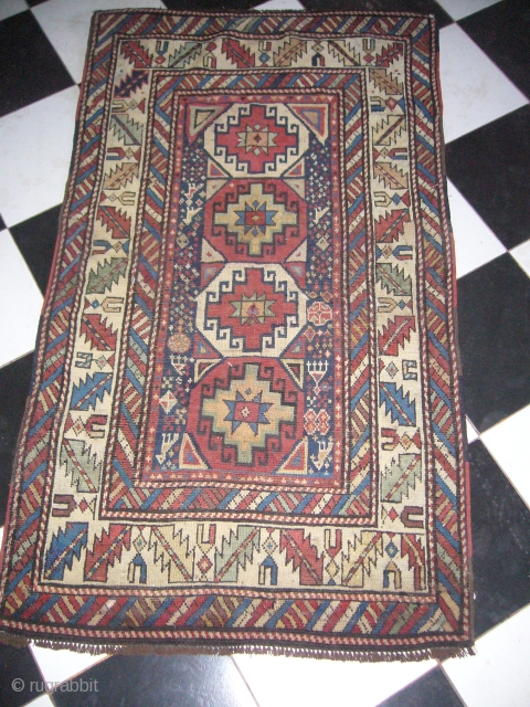 Kuba Rug with a mogan gul,very nice colours and good desigen.E.mail for more info.Please see other items also.               