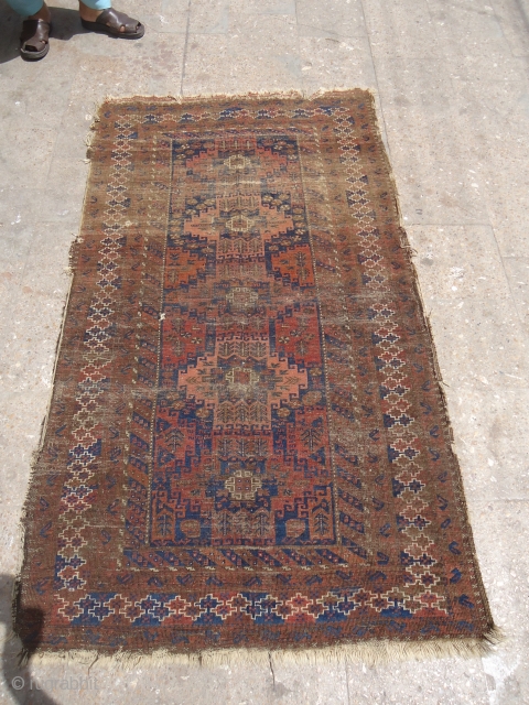 Baluch Rug with worn condition but good age and colors.Fine weave,Size 6'3"*3'7".E.mail for more info and pics,                