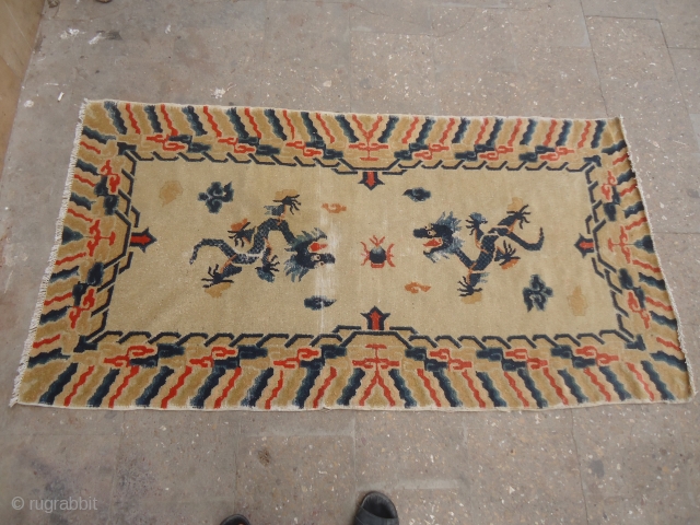 Chinese Dragon Rug with Ivory Groud,without any work or repair done,good age and colors.Size 6'*3'3".E.mail for more info and pics.             