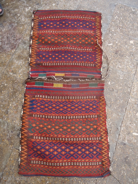 Uzbek saddle bag with beautiful colors and design,perfect condition,original nacking ,good colors.E.mail for more info                  