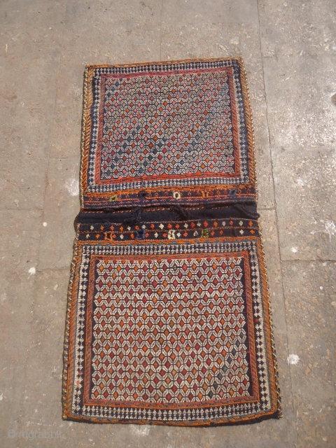 Flatwoven Qashqai  Khorjin Saddle bag with great design and colors,original kilim backing,excellent condition,colors.Good age,very nice pce with fine weave.Size 3'4"*1'9".E.mail for more info and pics.       