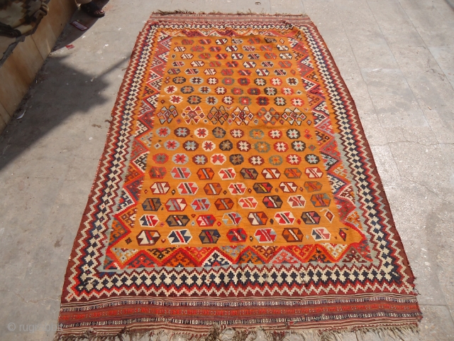 Beautiful Mustard Ground Qashqai Kilim with great colors and fine weave,beauitful design and good age,as found without any repair or work done.Size 8'8"*5'2".E.mail for more info and pics.     