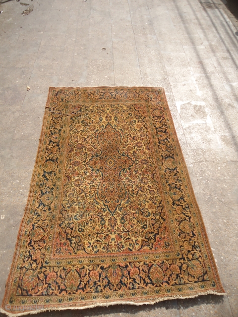 Kashan Rug with good age,beautiful colors and desigen,fine weave,as found without any repair or work done,tear on one side see the last pictures,otherwise reasonable condition.E.mail for more info and pics.   