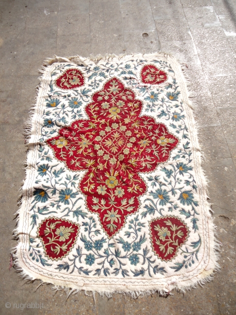 Embroided Felt Rug,all wool beautiful colors,nice desigen and good age,Good condition,Size 5'8"*3'10".E.mail for more info and pics.                