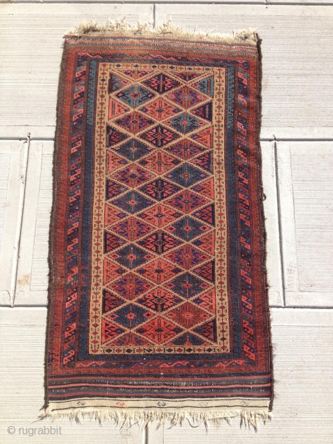 Cool Baluch with some nice blues and very pleasing pink. Kilim ends are there but unraveling. Minor corrosion in brown color. Sides look as if they were done some time ago. US  ...