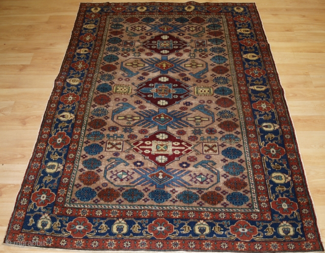 Antique Turkish Kayseri rug with traditional Caucasian 'Kuba' region design.
Circa 1920.
Size: 5ft 7in x 3ft 11in (170 x 120cm).
The rug has a classic Caucasian design on a very soft ground colour with  ...