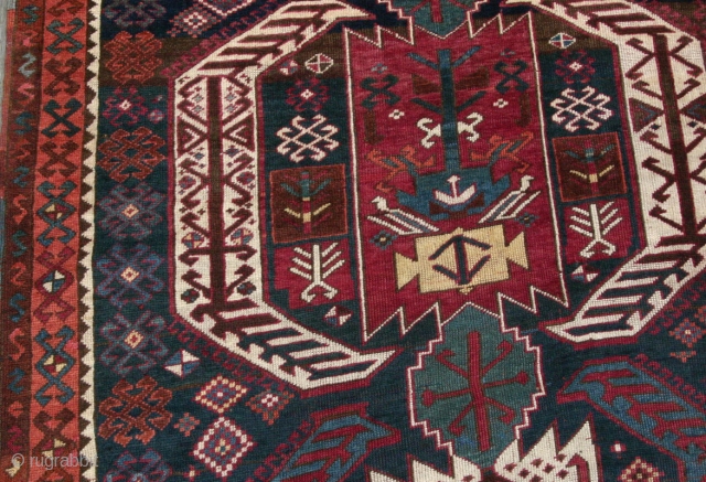 (70) Kagizman Kurd, 130 x 267 cm.,  Eastern Anatolian village rug with a hefty handle and full pile of soft, lanolin-rich wool. It is in excellent condition with some minor repairs.

-Kolya
 