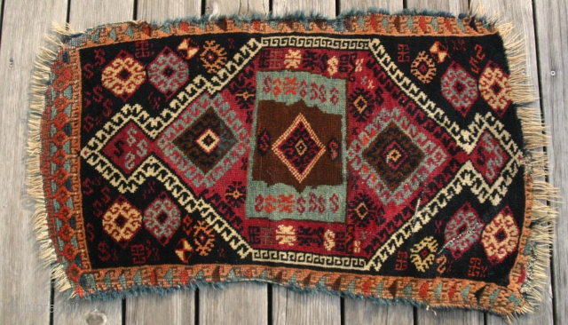 {77} Kurd Yastik, 45 X 81 cm, in decent condition for its age, stunning "modern" design, unrestored. 
-Kolya               