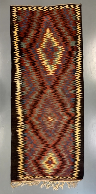 Modern art well before the term was invented. Brilliant and skillful weaving by someone who didn't play by all the rug rules of the day, and preferred to color way outside the  ...