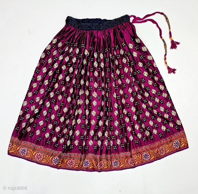 An very Rare Mochi Bharat And Silk Embroidery With Ghaghra Skirt ,

From Kutch Region Of Gujarat, North-West India,

Its very Fine Satin Silk Embroidered with Needle Chain Stich Design With Fine Mochi Bharat  ...