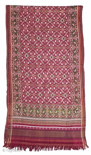 Patola Sari Silk Double ikat.Probably Patan Gujarat. India. this Patola sari has the type of geometric,non figurative pattern particularly favored by the ismaili Muslim merchant community of the Vohras.And its called Vohra-Gaji-Bhat.(Vohra  ...