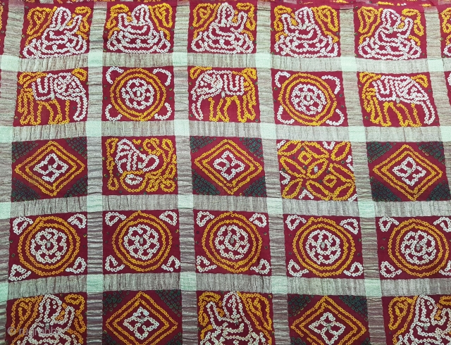 Gharchola  the Wedding Saree (also known as Ghatchola and Gharcholu) from Gujarat, India. This were  woven on Cotton fabric in large checks of using Real Zari threads. This is further  ...