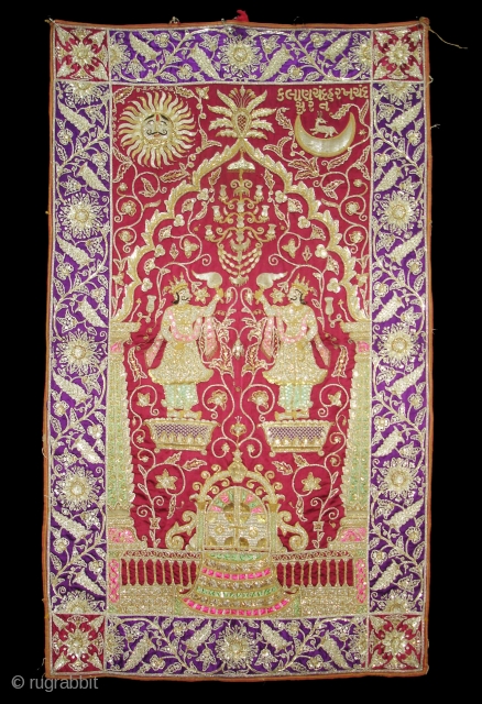 Jain temple hanging,Patan Gujarat,India,19th Century.Gajji-Silk,Silver And gold gilt embroidery.Its size is 82cmX197cm.This an holi temple piece,showing the Jain illustration of Moksha with Ridhi and Sidhi, And sun and the moon.Condition is very  ...