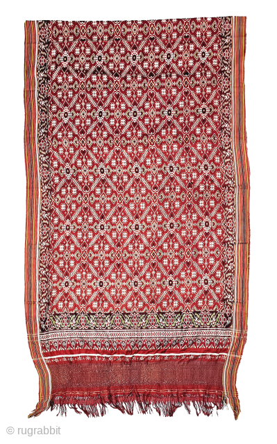 Patola Sari Silk Double ikat.Probably Patan Gujarat. India.

This Patola sari has the type of geometric,non figurative pattern particularly favored by the ismaili Muslim merchant community of the Vohras.And its called Vohra-Gaji-Bhat.(Vohra Type  ...