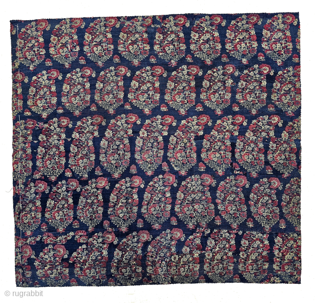 An Unique And Rare Indigo Blue Ground Color, Jaipuri Kani Jamawar Fragment From Kashmir, India.

C.1810-1825.

Its Size is 57cmx60cm.

Butas size is 7cmX10cm (20241223_134851).           