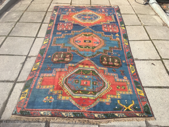 Caucasian rug in very good condition. It is 275x147, has at least two synthetic dyes, a rose red and one blue that has faded to bluish grey but also a couple of  ...