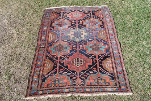 This rug is 148x108 cm. and probably from the Rozveh village in the Feridan area. Made between 1890-1920, all good colours and OK condition, with some wear, only issue is that is  ...