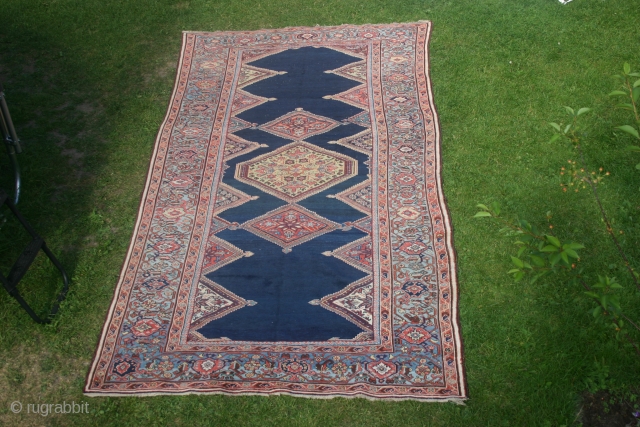 Old Persian rug, perhaps kurdish, Hamadan maybe, 380x220 cm. nice even wear, colours looks ok, some fading in green and yellow, lovely dark blue field. The ends need to be secured.  