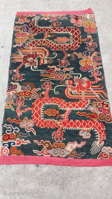 Tibetan double dragon carpet. Early 20th century. size 158cm * 86cm(62 inch* 34 inch)
                   