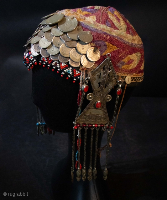  Original, rare embroidered headdress, with beading, silver coins and ear pendants. Kurdish , Khorasan , Northeastern Iran, Southern Turkestan.  Note similarity to Turkman style ear pendants. Early 20th c  